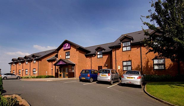 Exterior of Premier Inn Ross-On-Wye showing car park